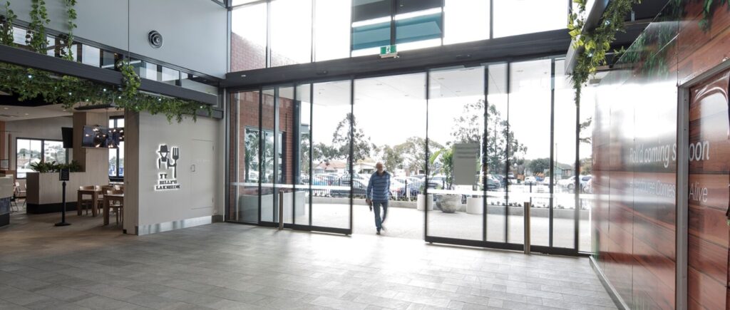 Weather-resistant and space-efficient entrance solution for outdoor areas, seamlessly blending durability with accessibility for enhanced convenience and security